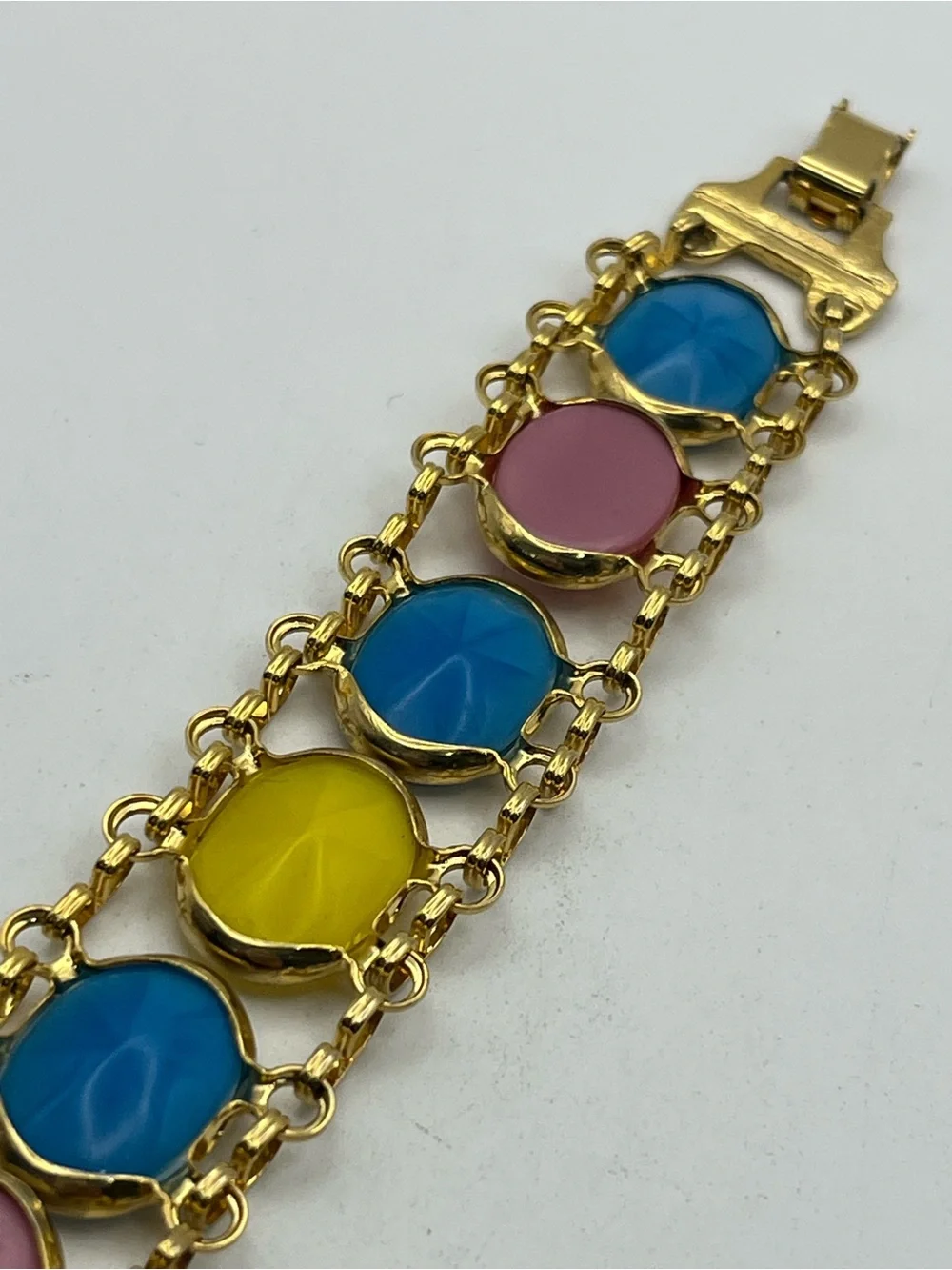 Pale Pink, blue, yellow oval cabochon gold tone vintage chain bracelet